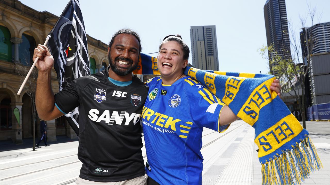 Penrith Panthers fan Glen Gomez and his Eels-loving girlfriend Natalie Tasioulas. Picture: Richard Dobson