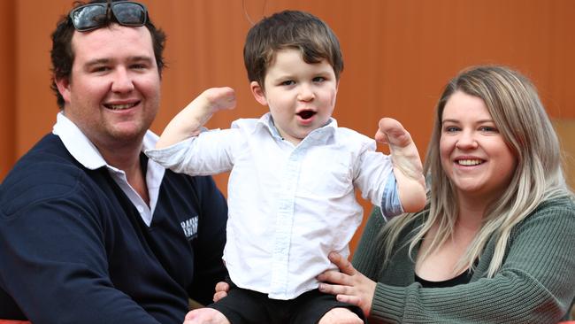 Riley Nixon, 4, with his parents Amy and Chad at the announcement of the Meningococcal B vaccine plan. Picture: Tait Schmaal.