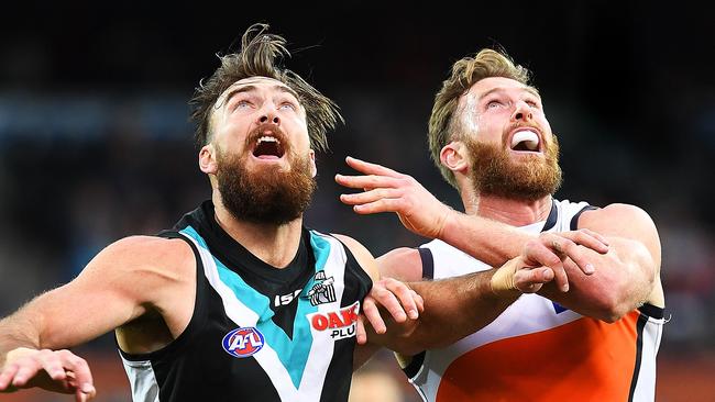 Charlie Dixon rucks against Giants giant Dawson Simpson in the Power’s home-ground loss on Sunday. Picture: Mark Brake/Getty Images