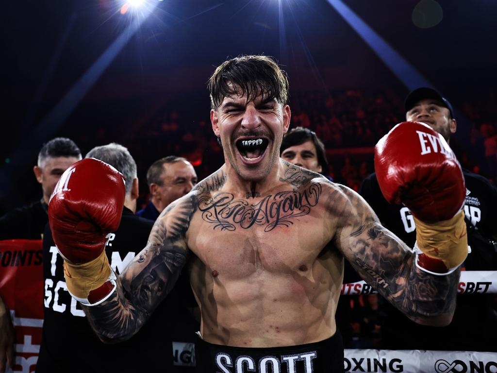 Curtis Scott celebrates his win over 47-year-old former Swans great Barry Hall. Pictures: No Limit Boxing/Gregg Porteous