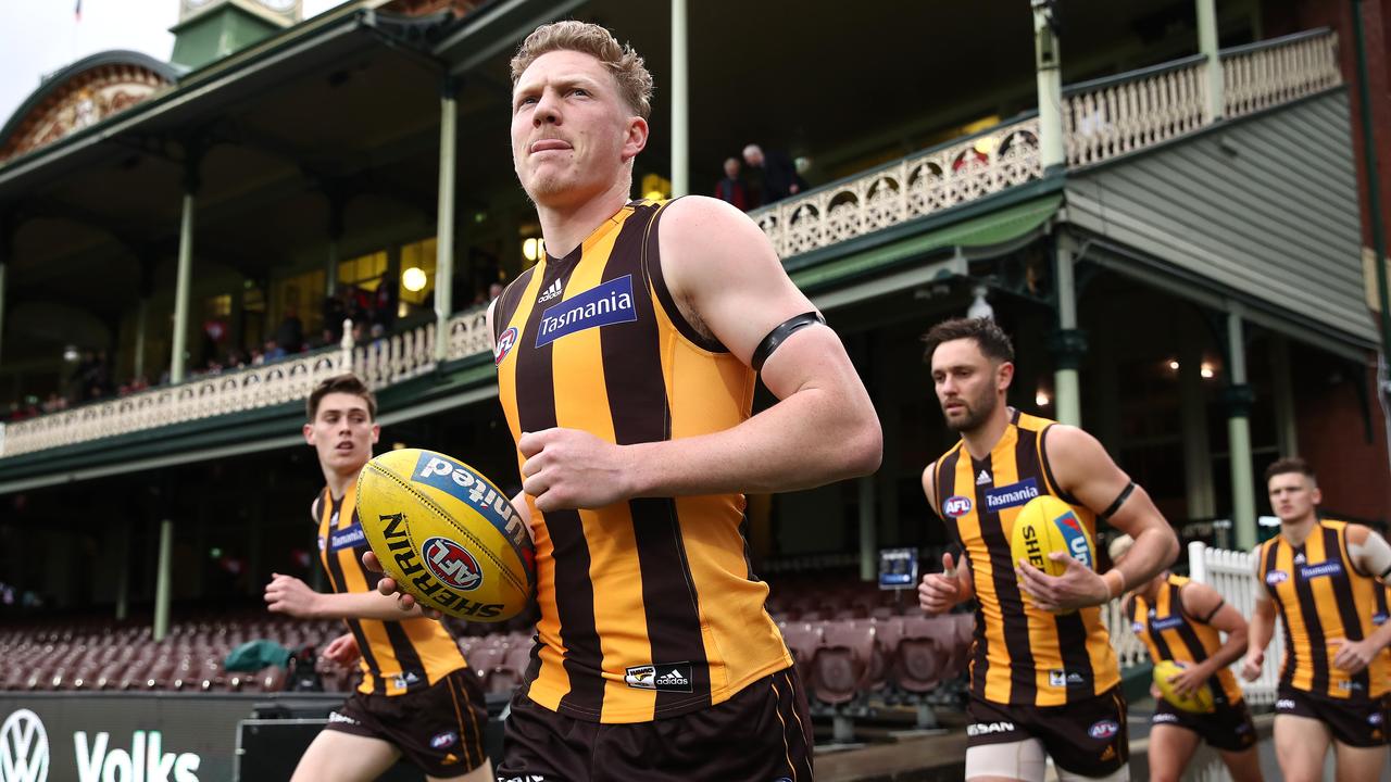 SYDNEY, AUSTRALIA - JULY 25: James Sicily of the Hawks runs out onto the field during the round 8 AFL match between the Sydney Swans and the Hawthorn Hawks at the Sydney Cricket Ground on July 25, 2020 in Sydney, Australia. (Photo by Cameron Spencer/Getty Images)