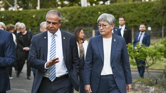 Penny Wong walks with Israel's Ambassador to Australia Amir Maimon during an October 7th vigil at the Israeli Embassy in Canberra. Picture: NewsWire / Martin Ollman