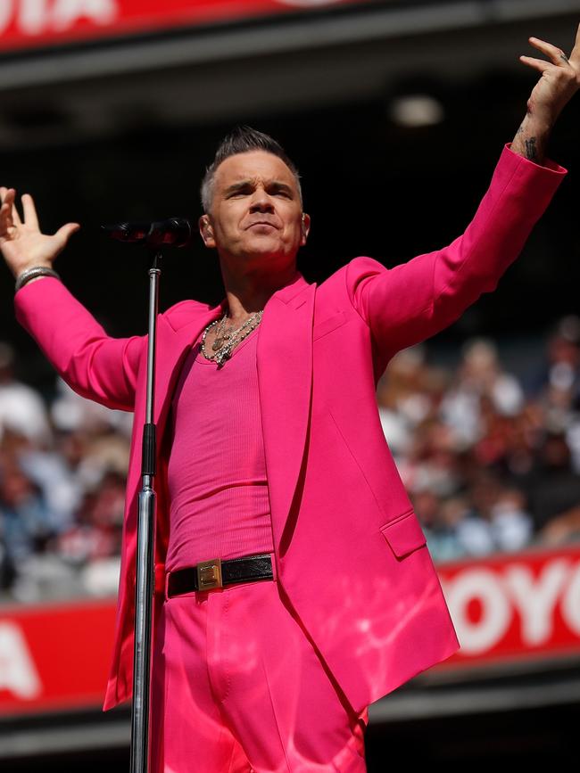 Robbie Williams was part of a run of top-tier performances during the AFL grand final in recent years, performing in 2022. Picture: Michael Willson/AFL Photos via Getty Images.