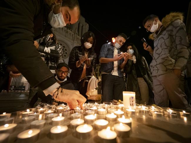 People pay tribute in front of the Notre Dame Basilica in Nice, France. Picture: Getty Images