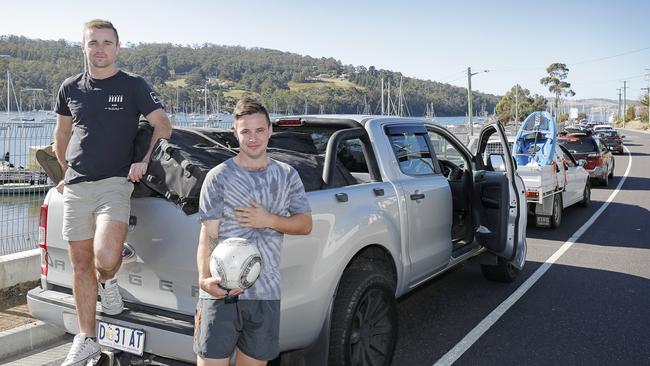 Justin Hudson and Matthew Garth wait in line for the Bruny Island ferry. Picture: PATRICK GEE