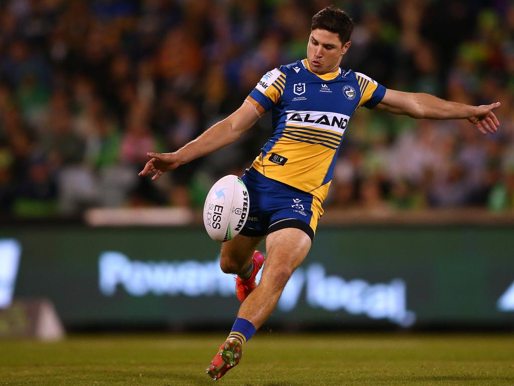 Mitchell Moses gets a kick away