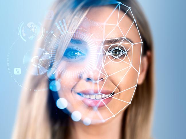 Smiling attractive businesswoman with facial recognition, digital interface with virtual globe hologram, padlock, binary code. Concept of modern technology, artificial intelligence, biometric scanning