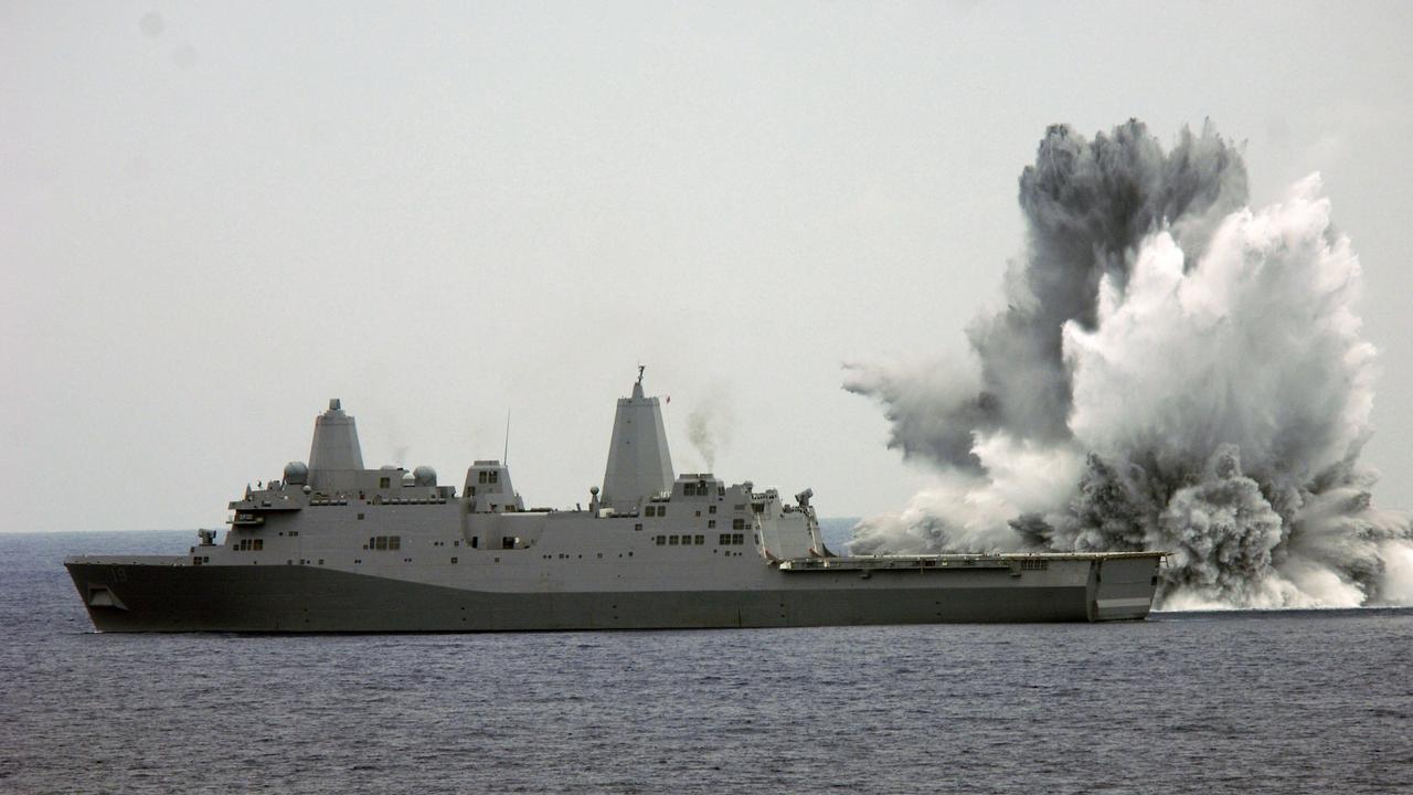 A 4500kg underwater explosion rocks a San Antonio-class amphibious transport dock. This test was narrowly prevented from becoming reality by an Australian decoy system used off Yemen. Picture: US Navy