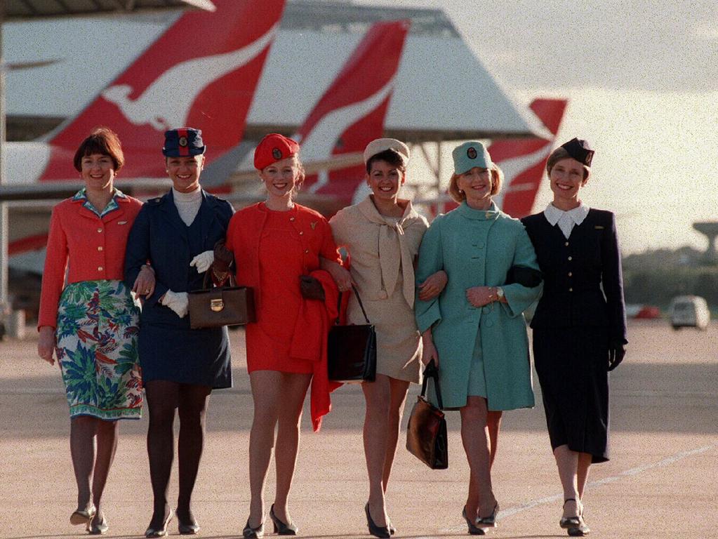 Models wearing hostess uniforms from the 1990s (L) through to the 1950s. Picture: Roy Haverkamp