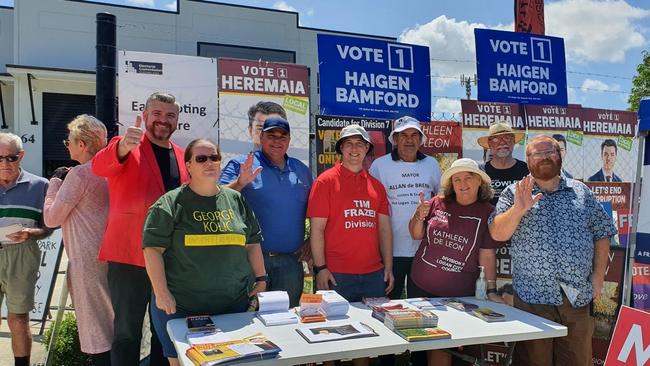 Mayoral candidate Stewart Fleming with volunteers putting down their how to vote cards at Browns Plains.