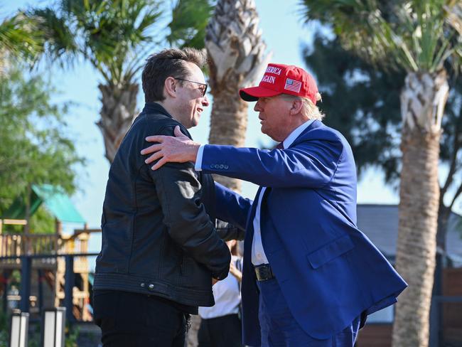 Donald Trump greets Elon Musk as he arrives to attend a viewing of the launch of the sixth test flight of the SpaceX Starship rocket in Brownsville, Texas. Picture: Getty Images via AFP