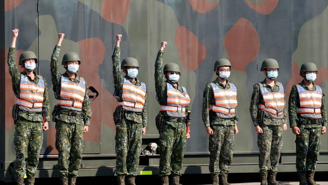 Members of Taiwan's chemical corps stand in formation during a an inspection by Taiwan's President Tsai Ing-wen. Picture: Sam Yeh/AFP