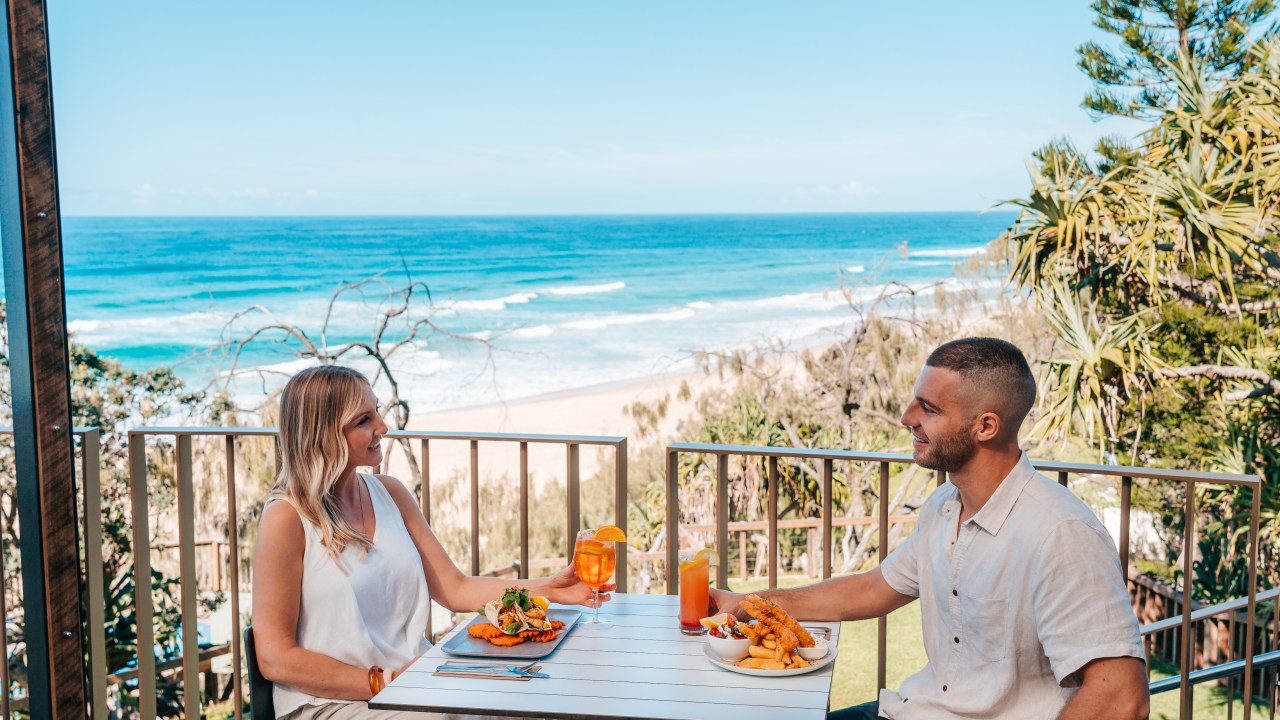 <h2>A schnitty at the Sunshine Beach Surf Club, QLD</h2><p><span>You don&rsquo;t need to be a millionaire to enjoy uninterrupted beach views in Noosa. Sunshine Beach Surf Club occupies one of the most prized positions in the region, perched on a grassy dune with sweeping views to Peregian Beach one way and Noosa Heads the other. Choose from one of the club's two decks to enjoy the Queensland sunshine or balmy evening air and a glass of one of their astonishingly good-value wine choices. The family-friendly menu is globally roaming, and covers all the bases, from pub classics like a chicken parma or fish tacos to a chilli crab spaghettini.</span></p>