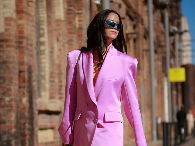 SYDNEY, AUSTRALIA - MAY 19: Alice Margot Christie wearing Alex Perry pink suit and Bulgari silver bag at Afterpay Australian Fashion Week 2023 at Carriageworks on May 19, 2023 in Sydney, Australia. (Photo by Hanna Lassen/Getty Images)