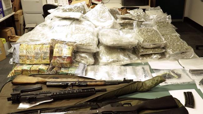 Police seized almost $2m in drugs and property after raids on a Comancheros bikie gang drug trafficking syndicate.