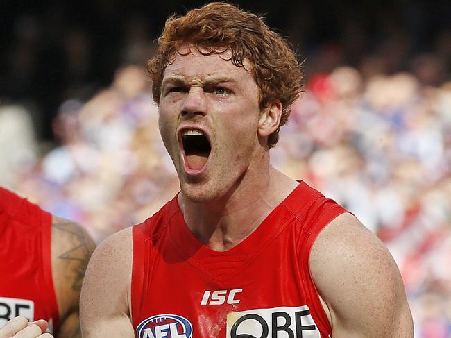 2016 AFL Grand Final match between the Western Bulldogs and the Sydney Swans at the Melbourne Cricket Ground (MCG), Melbourne, Australia on October 1, 2016. Sydney's Gary Rohan celebrates a goal as team mate Sydney's Lance Franklin comes in to congratulate him Picture: David Caird