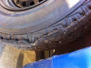 Half-inch thick tar layer on tyres from driving at roadworks between Jondaryan and Dalby. Photo Contributed. Picture: Contributed