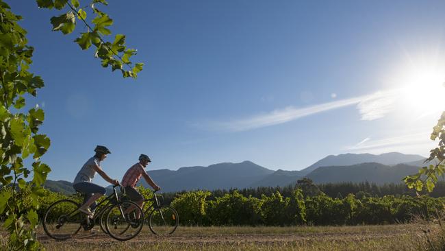 Cycling the rail trails around Bright. Picture: Visit Victoria