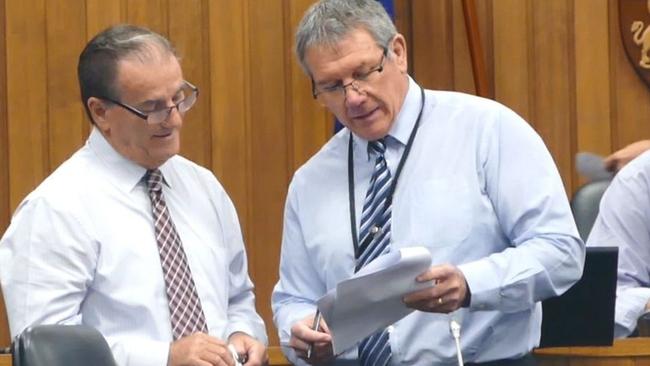 Clarence Valley Council mayor Jim Simmons and  director corporate Ashley Lindsay discuss the agenda before a council meeting.