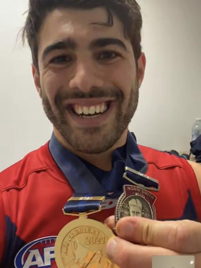 Christian Petracca shows off his medals on a call to Bella Beischer.