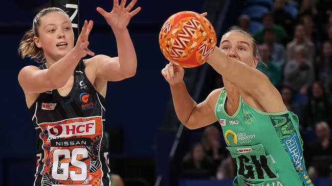 Courtney Bruce of the Fever blocks a pass for Sophie Dwyer of the Giants during the round five Super Netball match. Photo: Getty Images