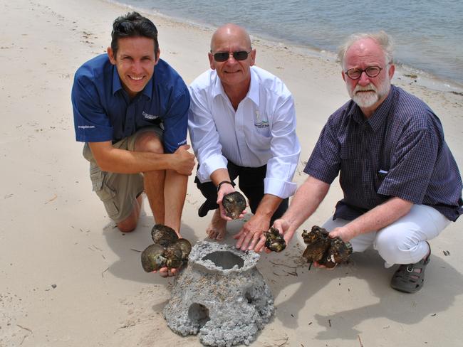 Ben Diggles (Digfish Services), Cr Gary Parsons and Rob King (Sunfish) at Sandstone Point today with shellfish and an artificial “reef ball”, which Shellfish grow on.