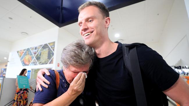 Avril Irons and Travis Irons at Gold Coast Airport after the Queensland border reopened to Victoria and all of New South Wales. Picture: Scott Powick