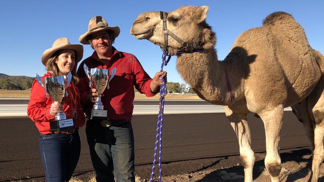 Jockey Rachael Woodham and Chris Hill from Uluru Camel Tours, at the Uluru Camel Cup. Picture: Supplied.