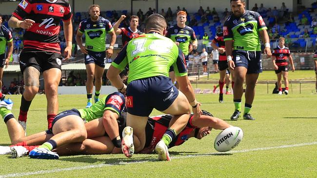 Joseph Suaalii reaches out to score a try for the Bears. Picture: Mark Evans/Getty Images