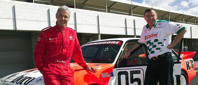 Legend … Peter Brock and Larry Perkins with the Holden Driving Team back in 1984.