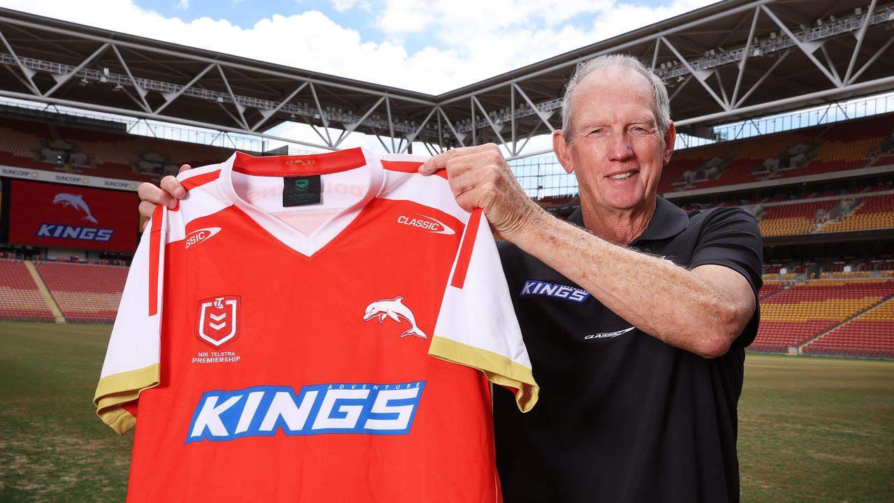 Coach Wayne Bennett holding the first Dolphins jersey, The Dolphins announce a sponsor and their first jersey, Suncorp Stadium, Milton. Picture: Liam Kidston.