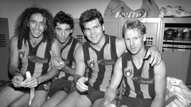 Dean Anderson (second from left) with Hawthorn teammates John Platten, Jason Dunstall and Andy Collins.