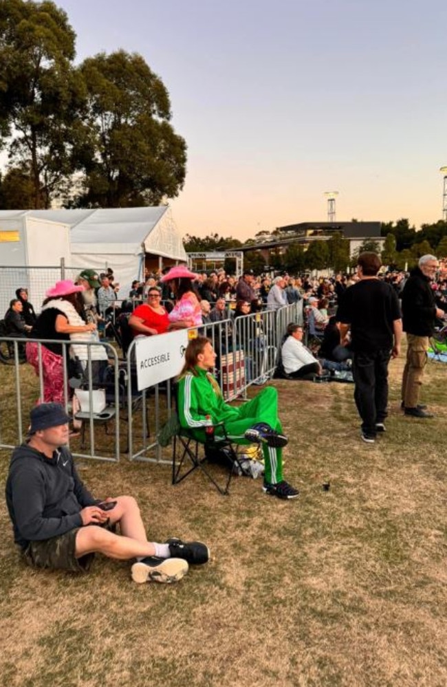 The 'accessible viewing area' was simply a fenced-off bit of grass. Picture: Joel King / Facebook