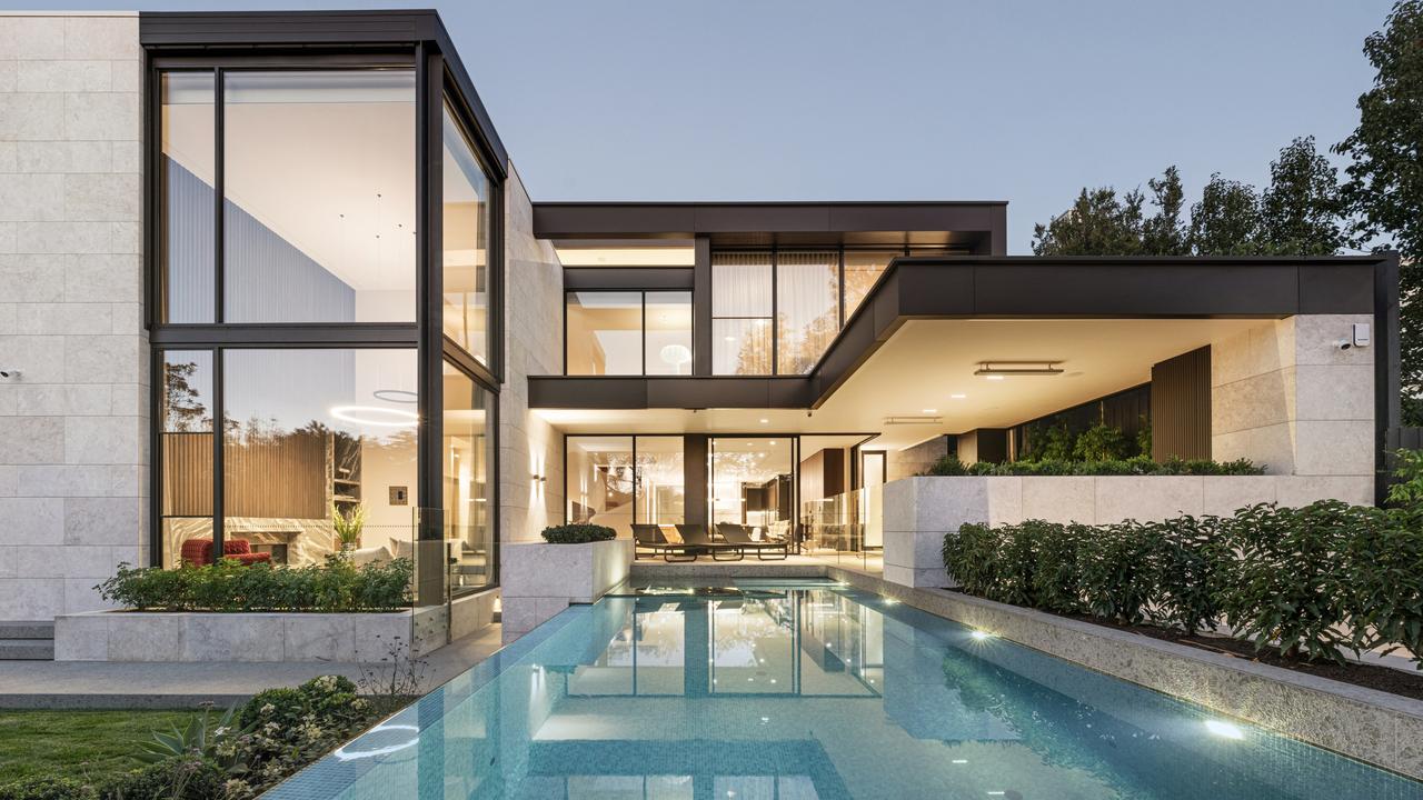 A new Toorak mansion at 12 Yarradale Rd comes with a $17.5m-$18.5m guide. Featues include a rooftop bar, infinity pool, cinema, and space for seven luxury cars.