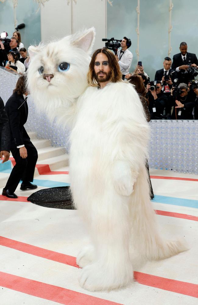 Actor Jared Leto reveals he is the mystery star dressed as Karl Lagerfeld’s cat. Picture: Getty Images