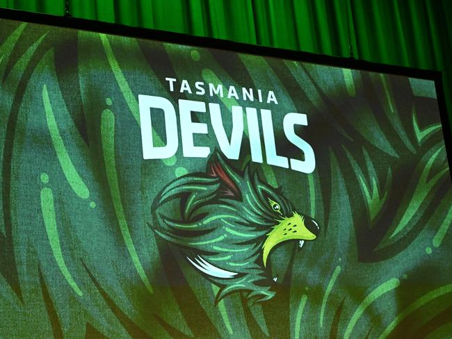 VARIOUS CITIES, AUSTRALIA - MARCH 18: The Tasmania Devils logo is unveiled during a media opportunity announcing the details for the Tasmanian AFL team, at Hobart Theatre Royal on March 18, 2024 in Various Cities, Australia. (Photo by Steve Bell/Getty Images)