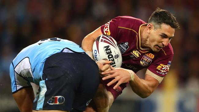 Billy Slater of the Maroons is tackled during Origin 3. Photo: Getty Images