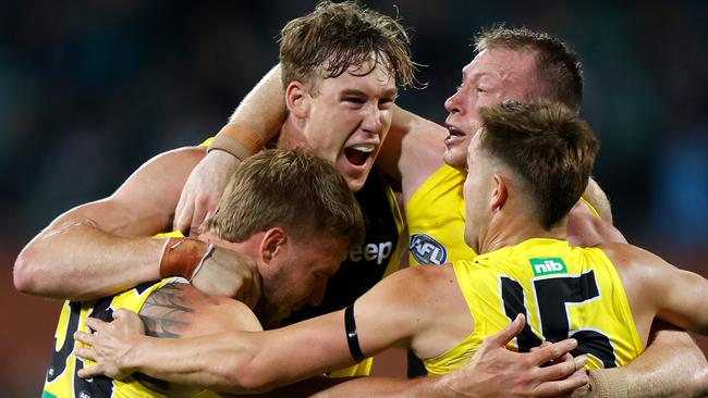 Nathan Broad, Tom Lynch, Dylan Grimes and Jayden Short of the Tigers celebrate during the 2020 AFL First Preliminary Final match against Port Adelaide.