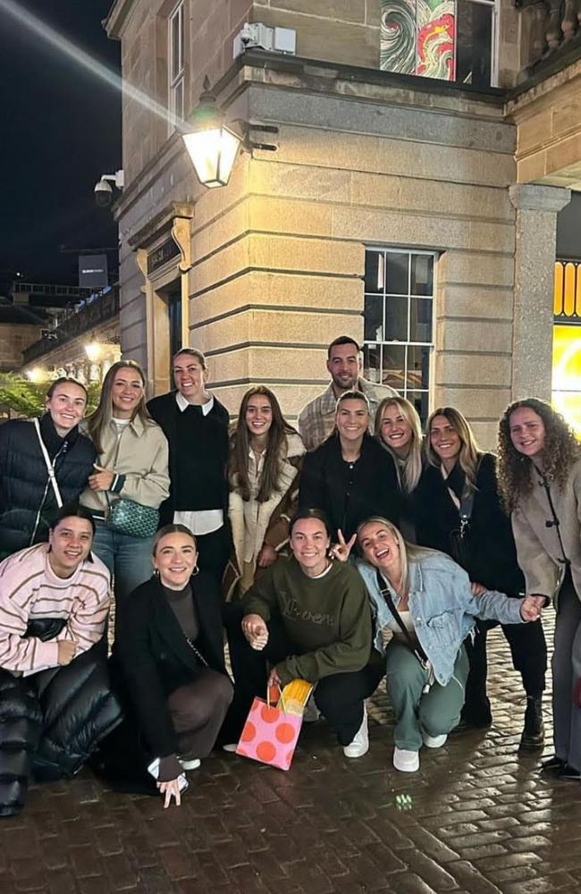 Sam Kerr, bottom left, fiancee, Kristi Mewis, and her West Ham teammates in London, Convent Garden. This picture was posted on Instagram the same night Sam Kerr appeared in court in London on Monday