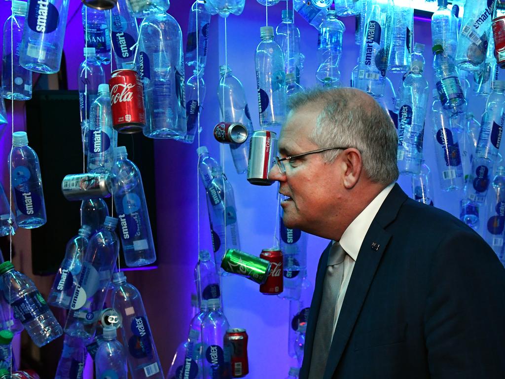 Prime Minister Scott Morrison walks past a plastic bottle installation at a clean oceans event at the United Nations in New York. Picture: Mick Tsikas/AAP