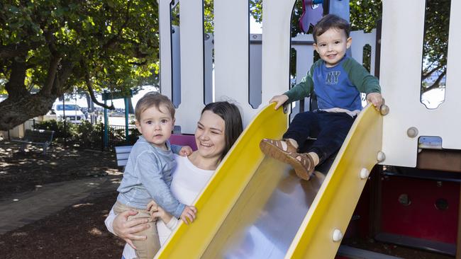 Jessy Meredith with three-year-old Oliver and two-year-old Eli, has an investment home in the Moreton Bay region and lives in one in the Brisbane City Council region because she saw both places booming. Picture: Richard Walker