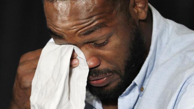 Jon Jones speaks during a news conference.