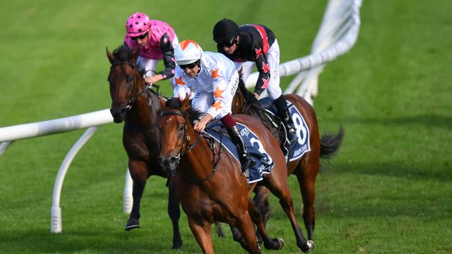 Jockey Hugh Bowman rides Farnan to victory in the Golden Slipper at Rosehill Gardens.