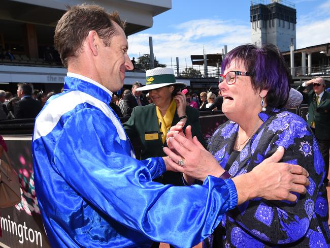 Hugh Bowman hugs an emotional Debbie Kepitis after her Turnbull Stakes win last year. Pic: Getty Images