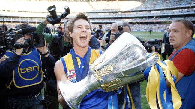 Ben Cousins holds the premiership cup in 2006.