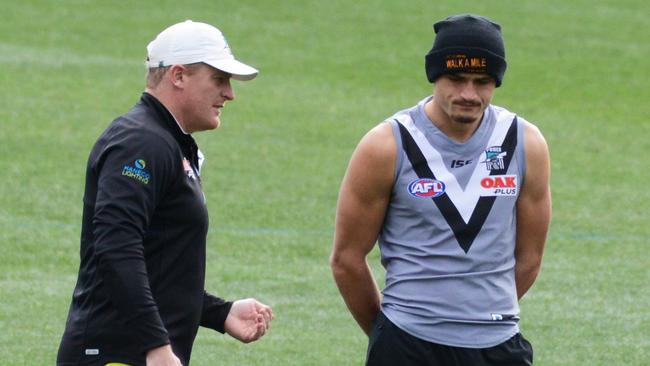 Power assistant coach Michael Voss with Sam Powell-Pepper at training in August. Picture: AAP Image/Brenton Edwards