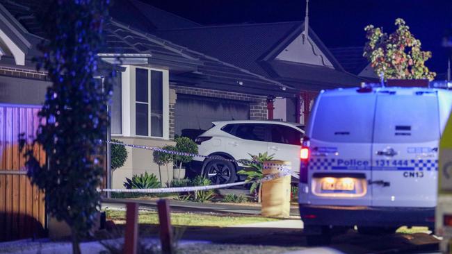 Fire damage is seen on the garage of the house at Crank Place. Picture: Dean Asher