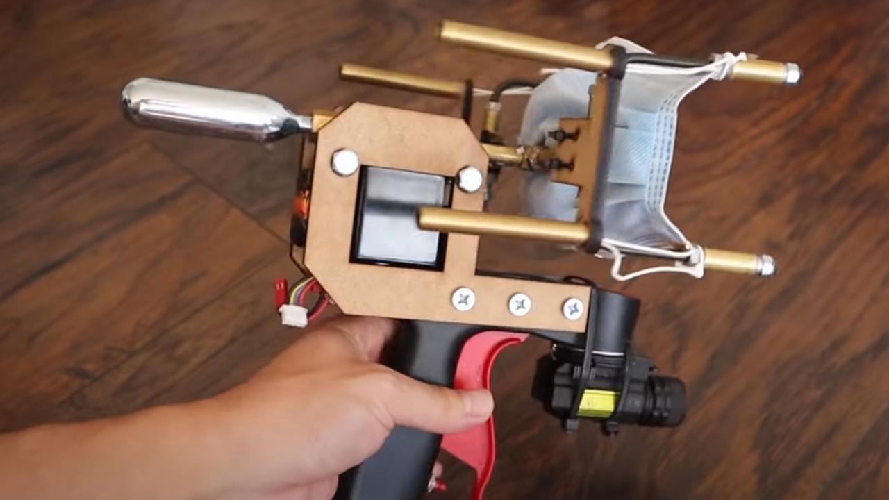 Allen Pan’s ‘Mask Gun’ – complete with a laser sight.