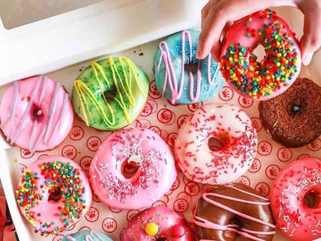 Teens working for Donut King at Rosebud Plaza took orders and cooked doughnuts. Picture: supplied