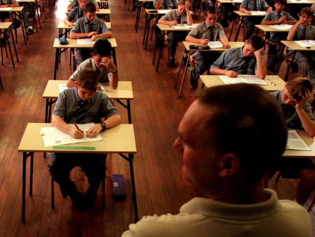 Ashfield Boys High school students sitting for the ELLA literacy test, Mar 01 1999 NSW / Education / Exams examinations classroom pupils teacher Generic